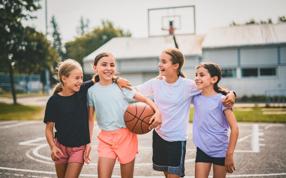 girls playing outdoor basketball